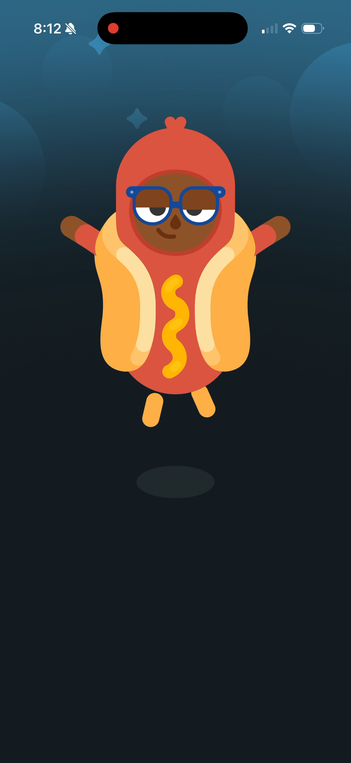 The Hot Dog suit appearing in full colour, arms out