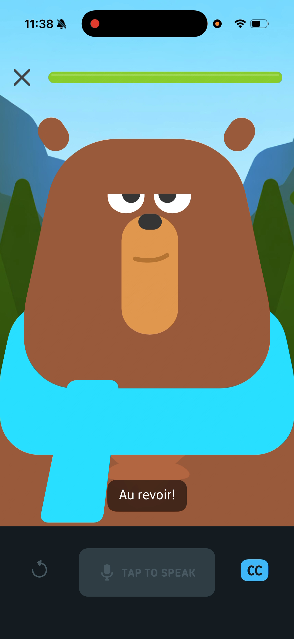 A Duolingo video call lesson — Falstaff the bear fills the screen, saying "Au revoir!", with a Tap to Speak button