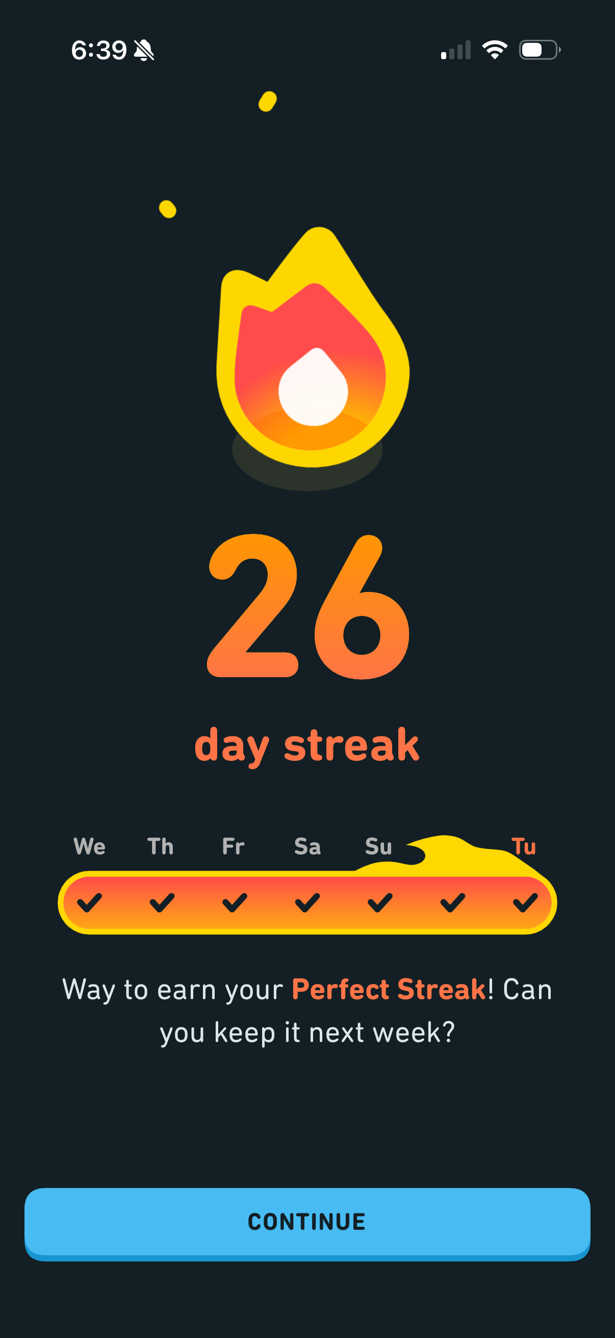 Perfect Streak post-lesson screen — orange flame with yellow halo, 26 day streak, continuous orange bar across all seven days