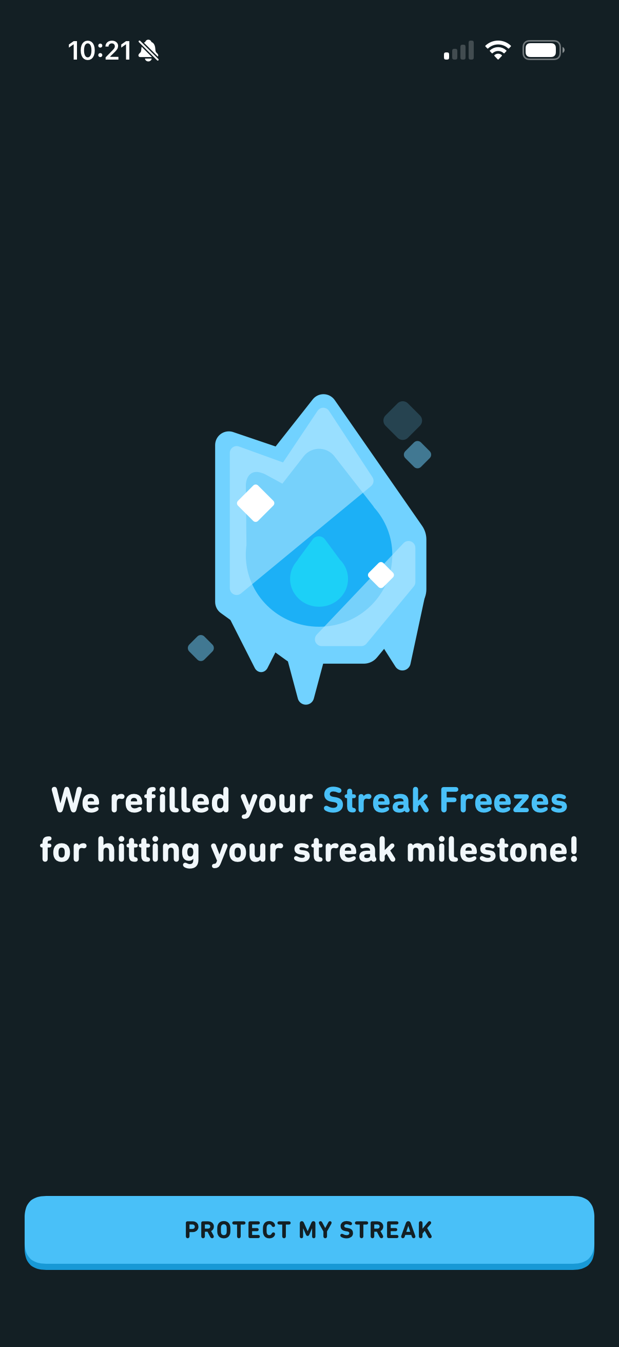 Full-screen modal: "We refilled your Streak Freezes for hitting your streak milestone!" with a melting ice block and a "PROTECT MY STREAK" button